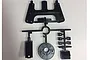 A black plastic Tamiya H parts tree containing various RC chassis components on a white background.