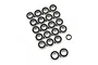 A collection of small metal ball bearings with black rubber seals arranged on a white background.