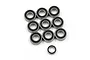 A collection of ten rubber shielded ball bearings of varying sizes arranged on a white background.