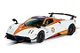 Scalextric 1/32 scale Pagani Huayra BC Roadster slot car in iconic Gulf blue and orange livery on a white background.