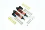 Two black GPM Racing piggyback RC shock absorbers with orange springs, plus extra gold and silver springs and mounting hardware.
