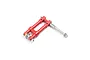 A red aluminium landing gear assembly for an RC plane, featuring metal struts, a mounting axle, and various nuts and washers against a white background.