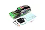 Losi 1/10 Grave Digger LMT painted body shell in black and green with decals, interior seat, and small hardware accessories on a white background.