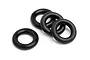 Four black rubber O-rings arranged on a white background.