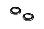 Two black anodized aluminium shock cap nuts for RC cars, featuring a knurled edge for grip.