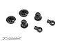 A set of black composite RC shock parts including spring retainers, shock caps, and ball ends on a white background.
