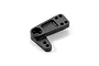 A black composite steering arm for an RC car, featuring multiple mounting holes and a central pivot point.