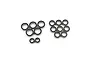 A collection of various sized rubber shielded ball bearings arranged on a white background.