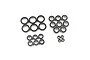 A collection of various sized rubber shielded ball bearings arranged in groups on a white background.