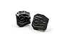 Two black and gold Yeah Racing brass differential covers for RC cars, shown from a front-facing angle on a white background.