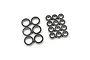 A collection of various sized rubber shielded ball bearings arranged in two groups on a white background.