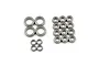 A collection of various sized metal shielded ball bearings arranged in groups on a white background.