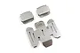 A set of three stainless steel skid plates for an RC car, featuring the Yeah Racing logo etched onto the metal surfaces.