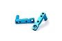 Two blue anodized aluminium servo mounts for RC cars, featuring threaded holes and a cylindrical post, isolated on a white background.