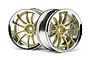 Two HPI Racing Work XSA 02C RC car rims featuring a gold multi-spoke center and a polished chrome outer lip, set against a white background.