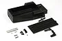 Kyosho black radio box set including a main plastic housing, lid, screws, clips, and small metal components on a white background.