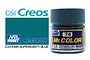A 10ml jar of Mr. Color Air Superiority Blue gloss acrylic paint, showing the blue cap and label with product number 74.