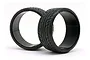 Two black HPI Racing RC drift tyres with Yokohama Advan Neova AD07 tread patterns standing on a white background.
