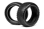 Two black Hot Bodies RC buggy block tread tyres standing upright against a white background.