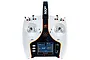 Spektrum NX7e 7-channel RC transmitter in white with a black center console, featuring a digital display screen and various control switches.