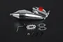 Rovan chrome pig tail tuned exhaust pipe for RC cars with red clamp, mounting bracket, gaskets, and hardware on a black background.