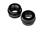 Two black anodized aluminium shock bottom caps for HPI Vorza RC cars, shown from a top-down angle on a white background.