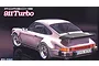 Box art for a Fujimi 1/24 scale Porsche 911 Turbo model kit featuring an illustration of a pink Porsche 911 Turbo on a dark background.