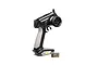 Spektrum DX5C 5-channel RC transmitter with steering wheel and trigger, shown with a small receiver unit on a white background.
