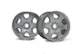 Two matte chrome HPI Savage Warlock RC monster truck wheels shown from a front-facing angle against a white background.