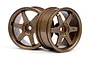 Two bronze-colored HPI TE37 style RC car rims with a 6-spoke design, shown against a white background.