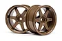 Two bronze-colored HPI TE37 style RC car rims with a 6mm offset, shown from a front-facing angle against a white background.