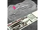 A clear, unpainted Bittydesign ARES-1 1/10 scale RC car body shell with a matching decal sheet on a dark textured surface.