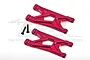 Two red anodized aluminium rear suspension arms for RC cars with two black screws, displayed against a white background with a faint GPM logo.