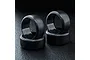 A set of four black MST 1.9 inch drift tyres arranged in two stacks on a dark textured surface.