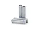 Four Kyosho Speed House Mini-Z AAA NiMH rechargeable batteries arranged with two standing upright and two lying horizontally on a white background.