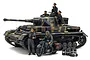 A fully assembled and painted 1/35 scale Tamiya Panzerkampfwagen IV Ausf.G model tank with crew figures, a motorcycle, and fuel canisters.