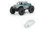 A 1/24 scale RC crawler with a painted blue-grey Coyote body shell, alongside an unpainted clear version of the same body shell.