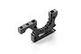 A black anodized aluminium rear right lower bulkhead for an XRAY RC car, shown from a high-angle studio perspective.