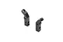 Two black anodized aluminium rear shock mounts for an XRAY RC car, shown from an angled perspective against a white background.