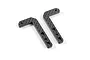 Two L-shaped graphite battery width adjustment plates for an RC car, featuring a carbon fiber weave pattern and mounting holes.