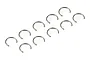 Ten small silver-coloured metal C-clips arranged in a staggered pattern against a white background.