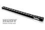 A black Hudy aluminium chassis ride height gauge with laser-etched measurements from 3.8mm to 8mm, shown on a white background.