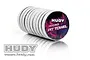 A stack of ten Hudy compact micro pit towels in a cylindrical shape against a white background.