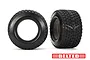 Two black Traxxas Gravix belted RC tyres with foam inserts, shown from side and front angles against a white background.