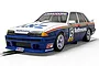 A Scalextric 1/32 scale Holden VL Commodore slot car in blue and white Rothmans racing livery on a white background.