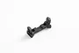 A black plastic RC shock tower component isolated on a white background.