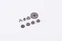 A set of small metal RC transmission gears and a shift fork arranged on a plain white background.