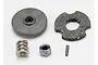 Traxxas slipper clutch components including a pressure plate, friction pad, spring, lock nut, and pin on a white background.