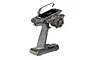 Futaba T10PX Limited Edition RC transmitter with a grey and black finish, featuring a steering wheel and digital display screen.