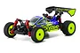 Kyosho Mini-Z Inferno MP9 RC buggy in blue and yellow with red shock absorbers and bright yellow wheels on a white background.